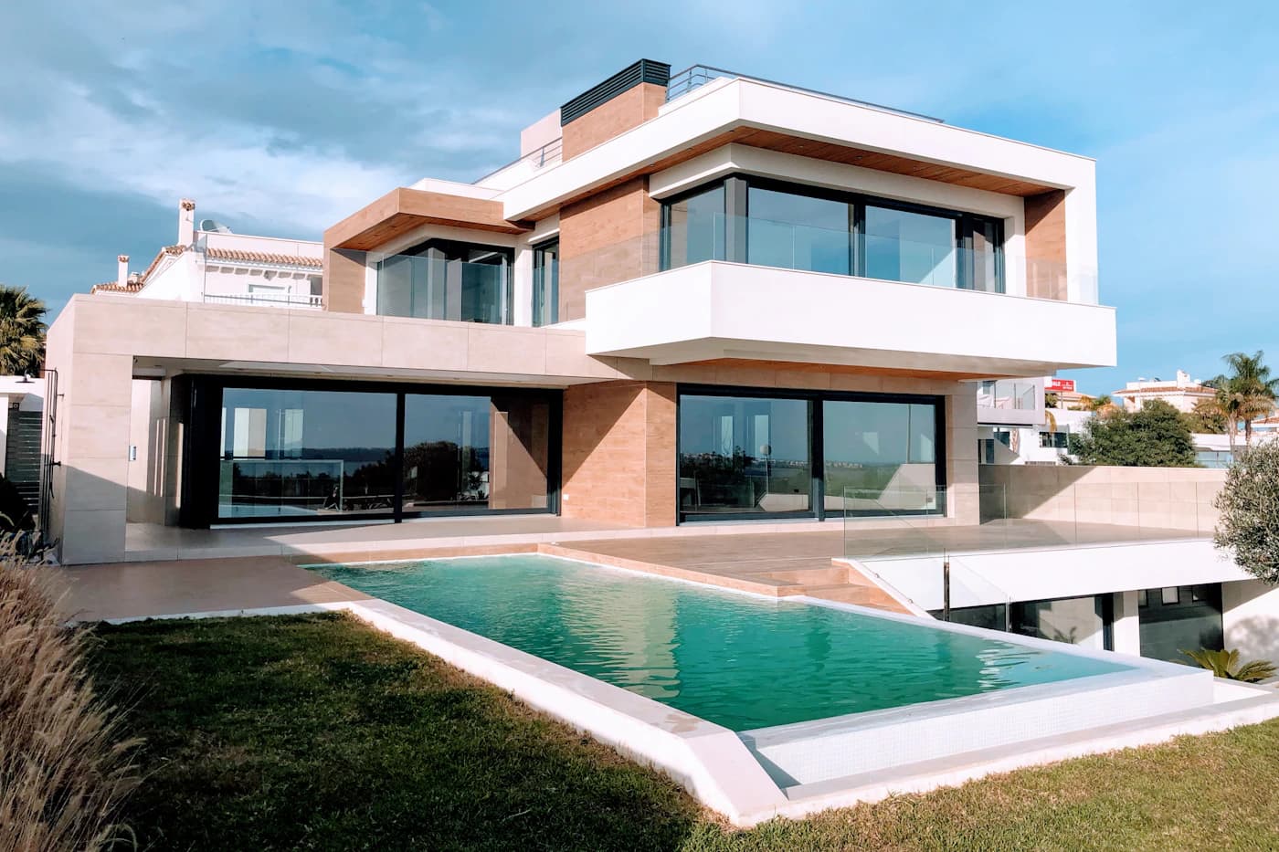 Representative photograph of a modern home exterior.
